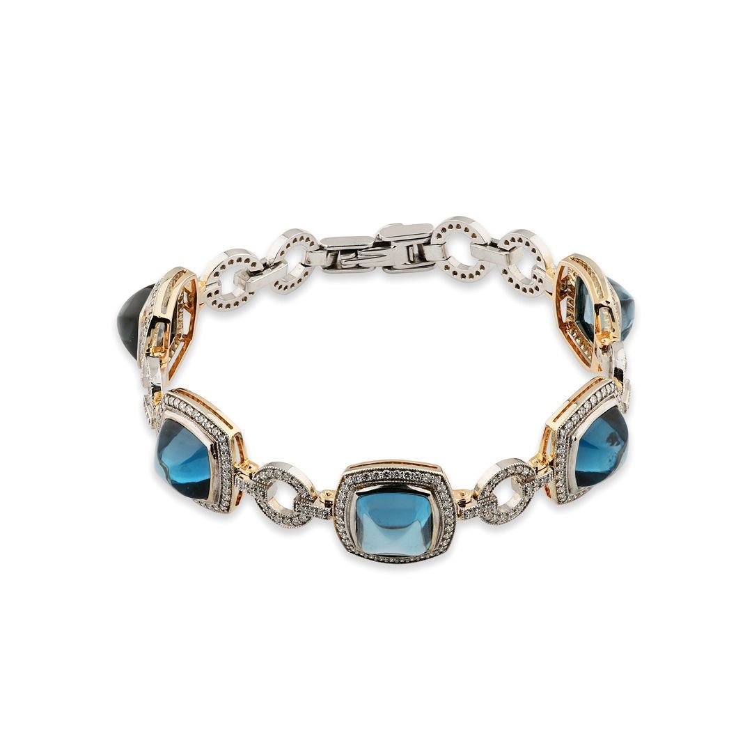 Браслет из белого золота с топазами и бриллиантами