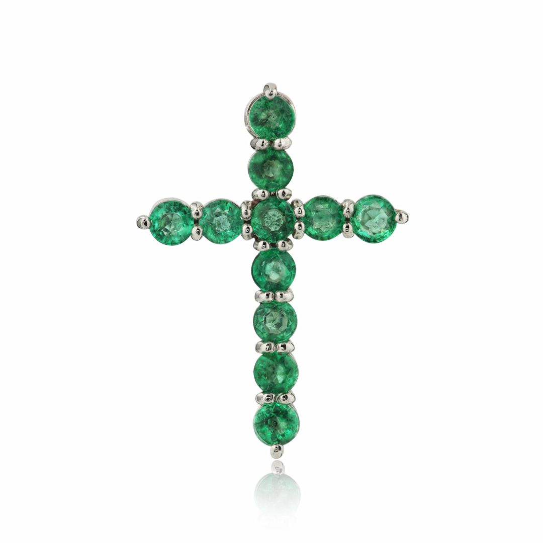 Крест из белого золота с изумрудами