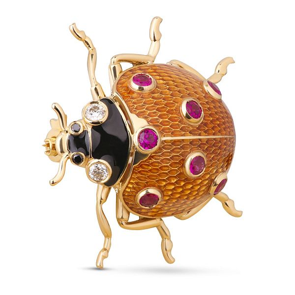 Брошь из желтого золота с рубинами и бриллиантами