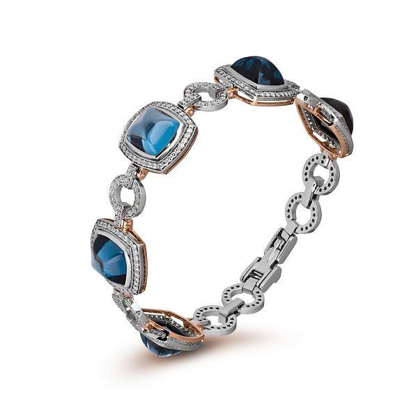 Браслет из белого золота с топазами и бриллиантами