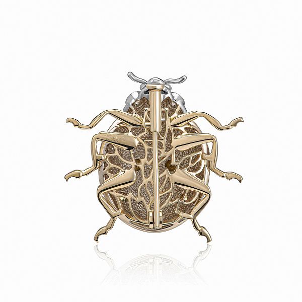 Брошь из желтого золота с бриллиантами и изумрудами