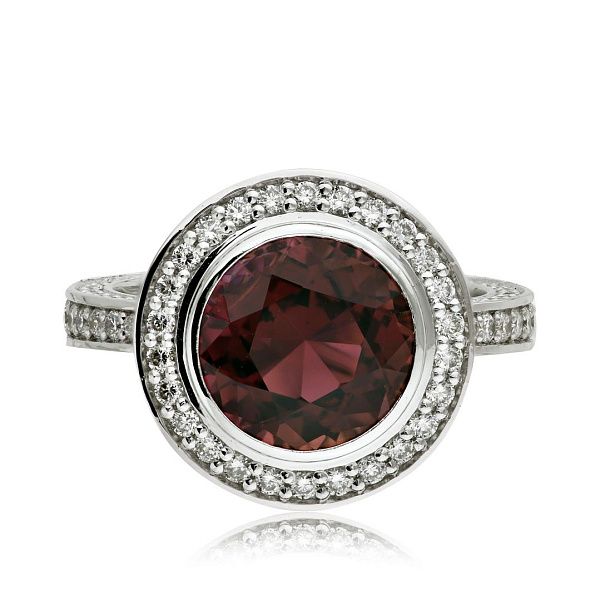 Кольцо из белого золота с турмалином 3.875 ct, сапфирами и бриллиантами