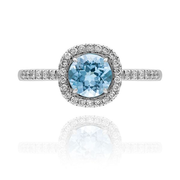 Кольцо из белого золота с топазом и бриллиантами