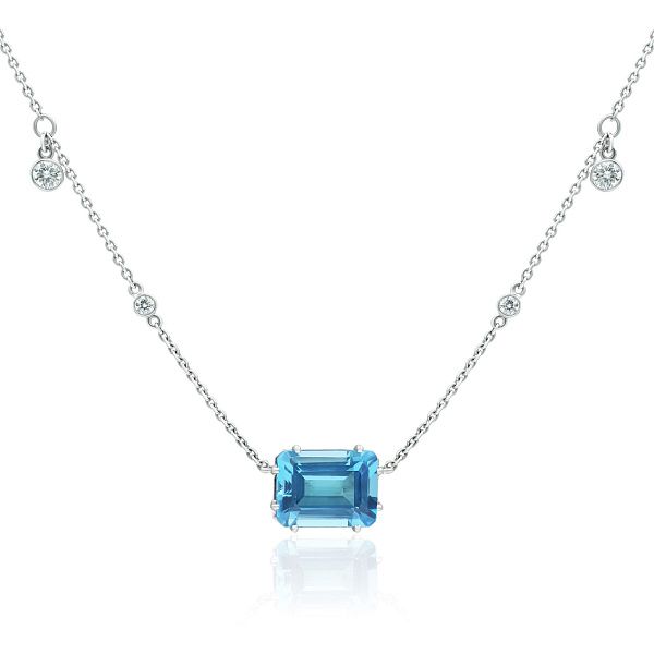 Колье из белого золота с топазом, рубинами и бриллиантами